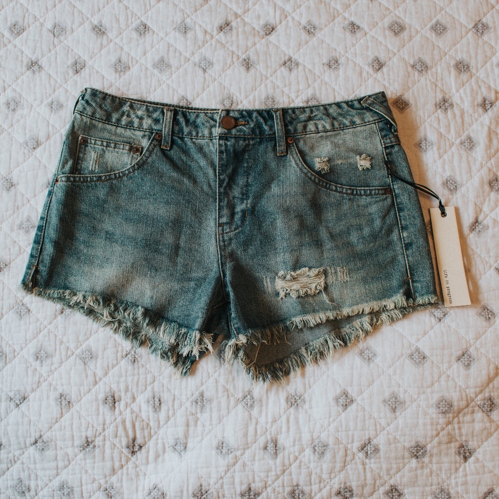 Trendy, distressed denim shorts